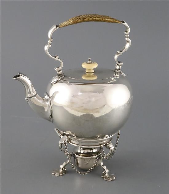 A George II silver bullet shaped tea kettle on stand with burner by George Greenhill Jones?,